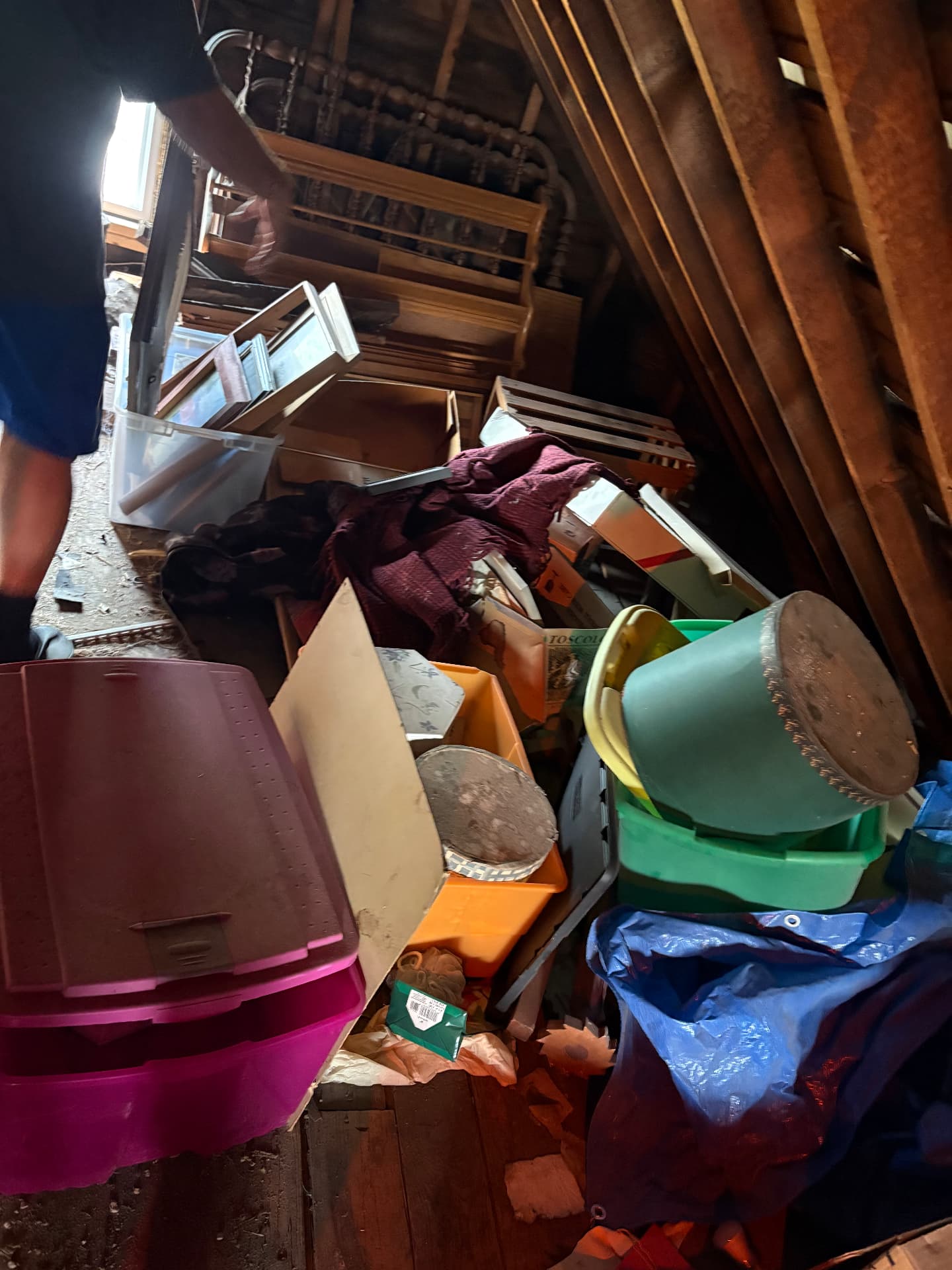 Junk Removal • Attic Cleanout — Cluttered attic before junk removal cleanout